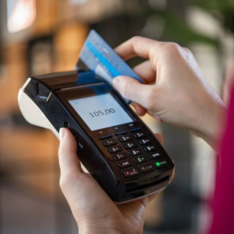 A debit card being used on a card machine